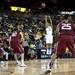 Michigan sophomore Trey Burke shoots a three-pointer in the first half against Indiana University-Purdue University Indianapolis on Monday. Michigan won 91-54. Daniel Brenner I AnnArbor.com